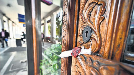 A shop sealed by NDMC in Connaught Place’s M Block in New Delhi on Thursday. (Sanchit Khanna/HT Photo)