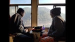 The people in these stories look like your average folks but “in the lives of nameless ‘uncles’ and ‘aunties’ we see the quick march of modernity.” (Shutterstock)