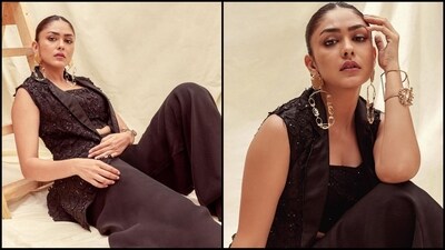 Mrunal Thakur is here to give you some stylish ethnic fashion inspiration as the diva stuns in an all black coordinated ensemble. The gorgeous actress is a total stunner who never fails to hit style targets like a pro. Whether it's a sartorial saree or a chic pantsuit, Mrunal can pull off any look to perfection. The stylish diva is quite active on social media and her glam Insta-diaries are nothing short of a treasure trove of style inspiration. Especially when it comes to ethnic fashion, Mrunal loves to get decked out in fancy sharara sets or exquisite anakalis. Her latest look, a three-piece black attire exuding glamour, is no exception and is sure to inspire your wardrobe. (Instagram/@mrunalthakur) Mrunal Thakur is here to give you some stylish ethnic fashion inspiration as the diva stuns in an all black coordinated ensemble. The gorgeous actress is a total stunner who never fails to hit style targets like a pro. Whether it's a sartorial saree or a chic pantsuit, Mrunal can pull off any look to perfection. The stylish diva is quite active on social media and her glam Insta-diaries are nothing short of a treasure trove of style inspiration. Especially when it comes to ethnic fashion, Mrunal loves to get decked out in fancy sharara sets or exquisite anakalis. Her latest look, a three-piece black attire exuding glamour, is no exception and is sure to inspire your wardrobe. (Instagram/@mrunalthakur)