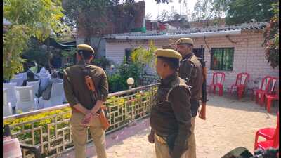 Armed security personnel on alert at the house of slain lawyer Umesh Pal in Prayagraj on Friday. (HT Photo) Armed security personnel on alert at the house of slain lawyer Umesh Pal in Prayagraj on Friday. (HT Photo)