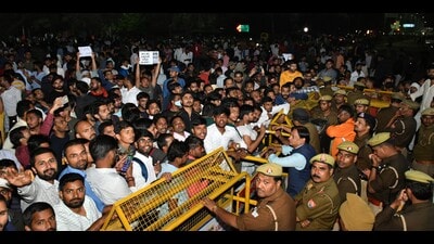 CAPTION: Students preparing for recruitment exams protesting near the UPPSC gate in Prayagraj on February 23. (HT photo) CAPTION: Students preparing for recruitment exams protesting near the UPPSC gate in Prayagraj on February 23. (HT photo)