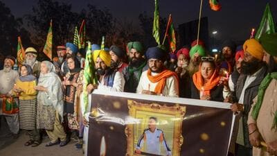 Farmers take part in a candlelight vigil in tribute to a farmer who was allegedly killed in Police action at Khanauri border during their 'Delhi Chalo' march, at the Punjab-Haryana Shambhu border, in Patiala district, on Friday. (PTI) Farmers take part in a candlelight vigil in tribute to a farmer who was allegedly killed in Police action at Khanauri border during their 'Delhi Chalo' march, at the Punjab-Haryana Shambhu border, in Patiala district, on Friday. (PTI)