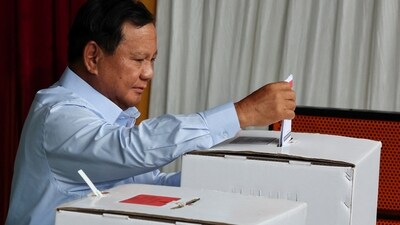 Presidential candidate Prabowo Subianto votes at a polling station during the general election in Indonesia. (REUTERS)