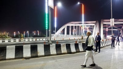On his arrival in Varanasi after a long and packed day in Gujarat, PM Modi, in the late hours of Thursday, went to inspect the Shivpur-Phulwaria-Lahartara marg. (PTI) On his arrival in Varanasi after a long and packed day in Gujarat, PM Modi, in the late hours of Thursday, went to inspect the Shivpur-Phulwaria-Lahartara marg. (PTI)
