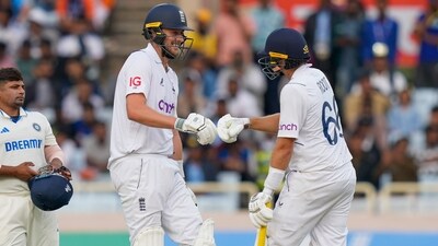 Joe Root (R) and Ollie Robinson stitched an important stand after the dismissals of Ben Foakes and Tom Hartley, sharing an unbeaten 57-run stand for the eighth wicket (PTI) Joe Root (R) and Ollie Robinson stitched an important stand after the dismissals of Ben Foakes and Tom Hartley, sharing an unbeaten 57-run stand for the eighth wicket (PTI)
