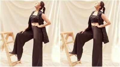 Assisted by hairstylist Teji Singh, Mrunal pulled back her luscious long locks and tied them into a neat bubble ponytail, which complemented her head-turning look perfectly and added the finishing touch to her appearance. (Instagram/@mrunalthakur) Assisted by hairstylist Teji Singh, Mrunal pulled back her luscious long locks and tied them into a neat bubble ponytail, which complemented her head-turning look perfectly and added the finishing touch to her appearance. (Instagram/@mrunalthakur)