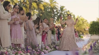 While fans on social media gush over Rakul Preet Singh and Jackky Bhagnani's refreshingly real wedding celebration video, we can't help but take in the high-on-style vibe of the bride, who danced as she walked down the aisle, with the wedding guests cheering her on. 