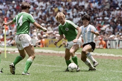 Argentina's Diego Maradona (R) fights for the ball with German Andreas Brehme (C) and his teammate Thomas Berthold during the final match of the 1986 Football World Cup Federal Republic of Germany vs. Argentina on June 29, 1986 at Mexico City. Andreas Brehme, who scored from the penalty spot to seal victory for West Germany against Argentina in the 1990 World Cup final, died overnight into February 20, 2024 at the age of 63, his former club Bayern Munich said. (Photo by AFP) (AFP) Argentina's Diego Maradona (R) fights for the ball with German Andreas Brehme (C) and his teammate Thomas Berthold during the final match of the 1986 Football World Cup Federal Republic of Germany vs. Argentina on June 29, 1986 at Mexico City. Andreas Brehme, who scored from the penalty spot to seal victory for West Germany against Argentina in the 1990 World Cup final, died overnight into February 20, 2024 at the age of 63, his former club Bayern Munich said. (Photo by AFP) (AFP)
