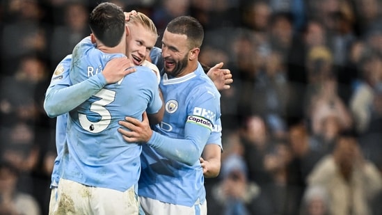 Manchester City celebrate a goal. (AFP)