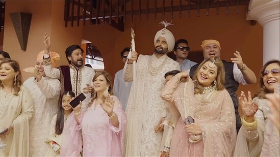 At the Anand Karaj ceremony, groom Jackky Bhagnani looked handsome in his golden and cream attire. His day-time wedding look screamed elegance and sophistication. The actor-producer was captured with his family, in a candid moment in the official video, ahead of the ceremony on Wednesday morning in Goa.