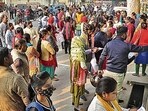 Candidates wait outside an examintaion centre to appear in Uttar Pradesh Teacher Eligibility Test 2021 (UPTET Exam 2021), in Moradabad, November 28, 2021. The examination had been cancelled due to alleged paper leak. (PTI File)