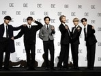 File- Members of South Korean K-pop band BTS pose for photographers during a press conference to introduce their new album "BE" in Seoul, South Korea on Nov. 20, 2020. Singers RM and V of the K-pop band BTS began their mandatory military duties under South Korean law, their management agency announced Monday, Dec. 11, 2023. This came a day before two of their bandmates, Jimin and Jung Kook, were also expected to report for duty. (AP Photo/Lee Jin-man, File)