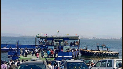 A fishing boat pulled the ferry out of the concrete passageway. A fishing boat pulled the ferry out of the concrete passageway.