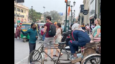 A rickshaw-puller tries to convince tourists to hire him in Hazratganj. (Deepak Gupta) A rickshaw-puller tries to convince tourists to hire him in Hazratganj. (Deepak Gupta)