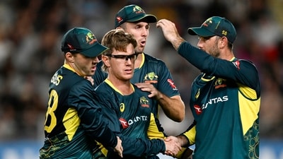Australian bowler Adam Zampa is congratulated by teammates (AP) Australian bowler Adam Zampa is congratulated by teammates (AP)
