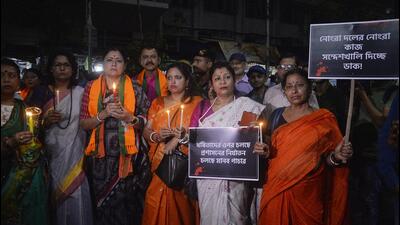 BJP Mahila Morcha workers take part in a candle light march demanding justice for the women in Sandeshkhali in Kolkata on Saturday. (ANI) BJP Mahila Morcha workers take part in a candle light march demanding justice for the women in Sandeshkhali in Kolkata on Saturday. (ANI)