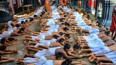 Children perform the 'Kuthiyottam' ritual at the Attukal Bhagavathy temple, ahead of the Attukal Pongala festival in Thiruvananthapuram. (PTI) Children perform the 'Kuthiyottam' ritual at the Attukal Bhagavathy temple, ahead of the Attukal Pongala festival in Thiruvananthapuram. (PTI)