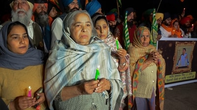 On Friday, farmers took part in a candlelight vigil in tribute to a farmer who was allegedly killed in Police action at Khanauri border during their 'Delhi Chalo' march, at the Punjab-Haryana Shambhu border, in Patiala district. (PTI) On Friday, farmers took part in a candlelight vigil in tribute to a farmer who was allegedly killed in Police action at Khanauri border during their 'Delhi Chalo' march, at the Punjab-Haryana Shambhu border, in Patiala district. (PTI)