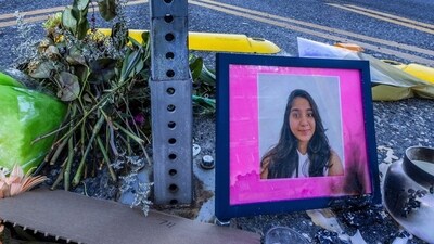 A photo of Jaahnavi Kandula is displayed with flowers, Jan. 29, 2023 in Seattle. (AP) A photo of Jaahnavi Kandula is displayed with flowers, Jan. 29, 2023 in Seattle. (AP)