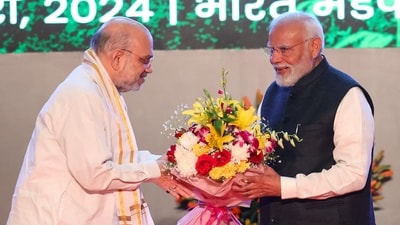 Prime Minister Narendra Modi with Union Minister Amit Shah during the inauguration & foundation stone laying ceremony of multiple key initiatives for cooperative sector at Bharat Mandapam in New Delhi on Saturday. (HT photo) Prime Minister Narendra Modi with Union Minister Amit Shah during the inauguration & foundation stone laying ceremony of multiple key initiatives for cooperative sector at Bharat Mandapam in New Delhi on Saturday. (HT photo)