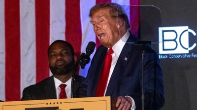 Former US President Donald Trump, right, speaks during the keynote address of the Black Conservative Federation (BCF) Honors Gala in Columbia, South Carolina, US, on Friday, Feb. 23, 2024. Trump is on the cusp of the Republican nomination and is looking to deliver a knockout blow to Nikki Haley, his last remaining GOP challenger, in her home state of South Carolina, which holds its primary on February 24. Photographer: Christian Monterrosa/Bloomberg (Bloomberg) Former US President Donald Trump, right, speaks during the keynote address of the Black Conservative Federation (BCF) Honors Gala in Columbia, South Carolina, US, on Friday, Feb. 23, 2024. Trump is on the cusp of the Republican nomination and is looking to deliver a knockout blow to Nikki Haley, his last remaining GOP challenger, in her home state of South Carolina, which holds its primary on February 24. Photographer: Christian Monterrosa/Bloomberg (Bloomberg)