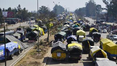 Tractor trolleys of farmers lined up at Shambhu on the Punjab-Haryana border on Friday. Farmer leaders have decided to halt the Delhi Chalo march till February 29. (ANI Photo) Tractor trolleys of farmers lined up at Shambhu on the Punjab-Haryana border on Friday. Farmer leaders have decided to halt the Delhi Chalo march till February 29. (ANI Photo)