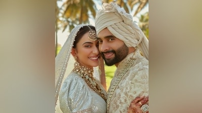 Meanwhile, Jackky chose an ivory sherwani for the photoshoot. He wore a bandhgala sherwani jacket embroidered in gold floral patterns and pearl embellishments. He wore it with matching pants, a layered pearl necklace, a pagdi, and a silk ivory kurta. (Instagram/@stylebyami) Meanwhile, Jackky chose an ivory sherwani for the photoshoot. He wore a bandhgala sherwani jacket embroidered in gold floral patterns and pearl embellishments. He wore it with matching pants, a layered pearl necklace, a pagdi, and a silk ivory kurta. (Instagram/@stylebyami)