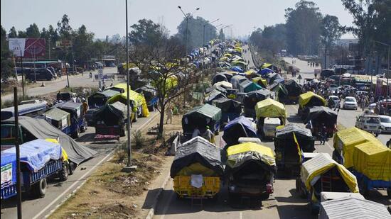 Tractor trolleys of farmers lined up at Shambhu on the Punjab-Haryana border on Friday. Farmer leaders have decided to halt the Delhi Chalo march till February 29. (ANI Photo)