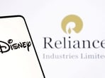 Disney and Reliance logos are seen in this illustration