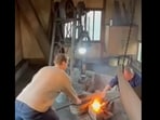 Mark Zuckerberg making a katana with Japanese sword master.  
