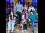 Namita Thapar posing for the camera with her sons Vir and Jai and their friends on the set of Shark Tank India.  