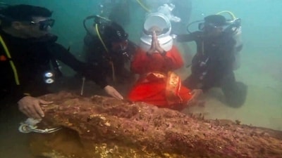 In the photos, PM Modi can be seen in scuba gear, descending into the azure waters to offer prayers at the site steeped in historical and spiritual significance.&nbsp; (ANI)