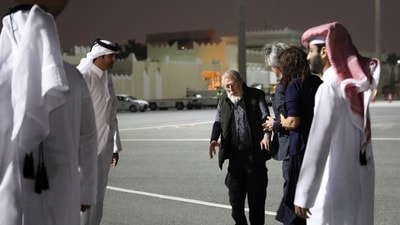 Released taliban hostage and Austrian national Herbert Fritz walks after disembarking from a plane, in Doha, Qatar, February 25, 2024. (REUTERS)