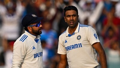 India's Ravichandran Ashwin and captain Rohit Sharma have a discussion. (AFP) India's Ravichandran Ashwin and captain Rohit Sharma have a discussion. (AFP)
