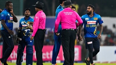 Sri Lanka's captain Wanindu Hasaranga (R) speaks with umpire Lyndon Hannibal (2R) during the third and final Twenty20 international cricket match between Afghanistan and Sri Lanka (AFP) Sri Lanka's captain Wanindu Hasaranga (R) speaks with umpire Lyndon Hannibal (2R) during the third and final Twenty20 international cricket match between Afghanistan and Sri Lanka (AFP)