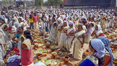 Devotees offer prayers before lighting the fire during the Attukal Pongala festival, in Thiruvananthapuram (PTI) Devotees offer prayers before lighting the fire during the Attukal Pongala festival, in Thiruvananthapuram (PTI)