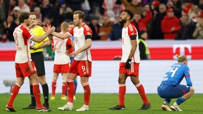 Bayern Munich's English forward #09 Harry Kane (C) and his teammates celebrate after the German first division Bundesliga football match between FC Bayern Munich and RB Leipzig (AFP) Bayern Munich's English forward #09 Harry Kane (C) and his teammates celebrate after the German first division Bundesliga football match between FC Bayern Munich and RB Leipzig (AFP)