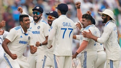 India celebrate a wicket against England. (AP) India celebrate a wicket against England. (AP)