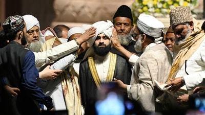 Syed Ahmed Bukhari, the Shahi Imam of Jama Masjid, is seen alongside his son, Syed Usama Shaban Bukhari, during a ceremony appointing the latter as his successor at Jama Masjid in Delhi, India, on Sunday, February 25. (Photo by Sanjeev Verma / Hindustan Times) (Hindustan Times)