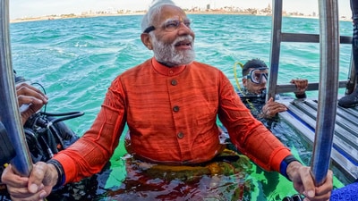 PM Modi after offering prayers underwater at the spot where the submerged city of Dwarka is, in Dwarka, Gujarat. (PTI)