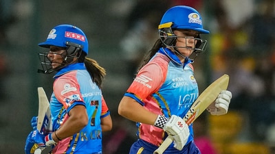 Mumbai Indians batters Harmanpreet Kaur and Amelia Kerr run between the wickets. (PTI) Mumbai Indians batters Harmanpreet Kaur and Amelia Kerr run between the wickets. (PTI)
