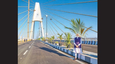 Prime Minister Narendra Modi during dedication of the Sudarshan Setu, India's longest cable-stayed bridge that will connect Okha mainland and Beyt Dwarka island, in Dwarka on Sunday. (PTI) Prime Minister Narendra Modi during dedication of the Sudarshan Setu, India's longest cable-stayed bridge that will connect Okha mainland and Beyt Dwarka island, in Dwarka on Sunday. (PTI)