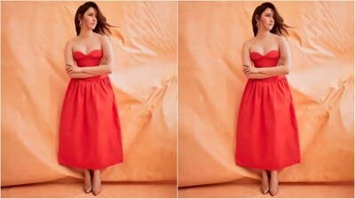 Tamannaah's outfit is from the shelves of clothing brand Forza Collective and features an alluring shade of orange, an off-the-shoulder sweetheart neckline, a corset bodice and a flared bottom. (Instagram/@tamannaahspeaks) Tamannaah's outfit is from the shelves of clothing brand Forza Collective and features an alluring shade of orange, an off-the-shoulder sweetheart neckline, a corset bodice and a flared bottom. (Instagram/@tamannaahspeaks)