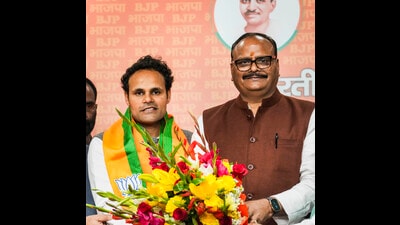 ok Sabha MP from Ambedkar Nagar Ritesh Pandey being greeted by UP Dy CM Brajesh Pathak as he joins the BJP, in New Delhi, Sunday (PTI) ok Sabha MP from Ambedkar Nagar Ritesh Pandey being greeted by UP Dy CM Brajesh Pathak as he joins the BJP, in New Delhi, Sunday (PTI)