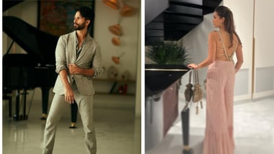 Shahid Kapoor and Mira Rajput make the most of the lavish decor of their home as they pose for pictures. The piano room seems to be one of their favourite spaces in the home. The black piano sits right next to a black staircase, and is easily one of the highlights of the couple's stylish abode. &nbsp; 
