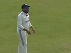 The image shows the moment when Rohit Sharma asked Sarfaraz Khan to wear a helmet. The image shows the moment when Rohit Sharma asked Sarfaraz Khan to wear a helmet.