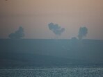 Smoke rises on the Lebanese side near the border with Israel, amid ongoing cross-border hostilities 