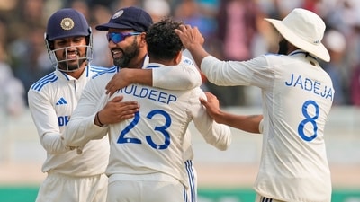India's Kuldeep Yadav is hugged by captain Rohit Sharma for the wicket of Tom Hartley on Day 3 of the fourth Test (AP) India's Kuldeep Yadav is hugged by captain Rohit Sharma for the wicket of Tom Hartley on Day 3 of the fourth Test (AP)