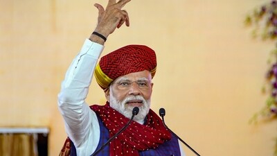 Prime Minister Narendra Modi addresses at a public meeting, in Rajkot, Sunday, Feb. 25, 2024. (PTI)