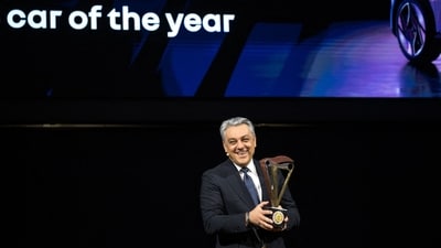 Luca De Meo, the Renault group's general director, displays the trophy for the Renault Scenic E-Tech electric model, honoured as the ‘European Car of the Year 2024’ by a panel of 59 automotive journalists from 22 countries. The moment was captured on Monday before the Geneva International Motor Show in Geneva. (AFP)